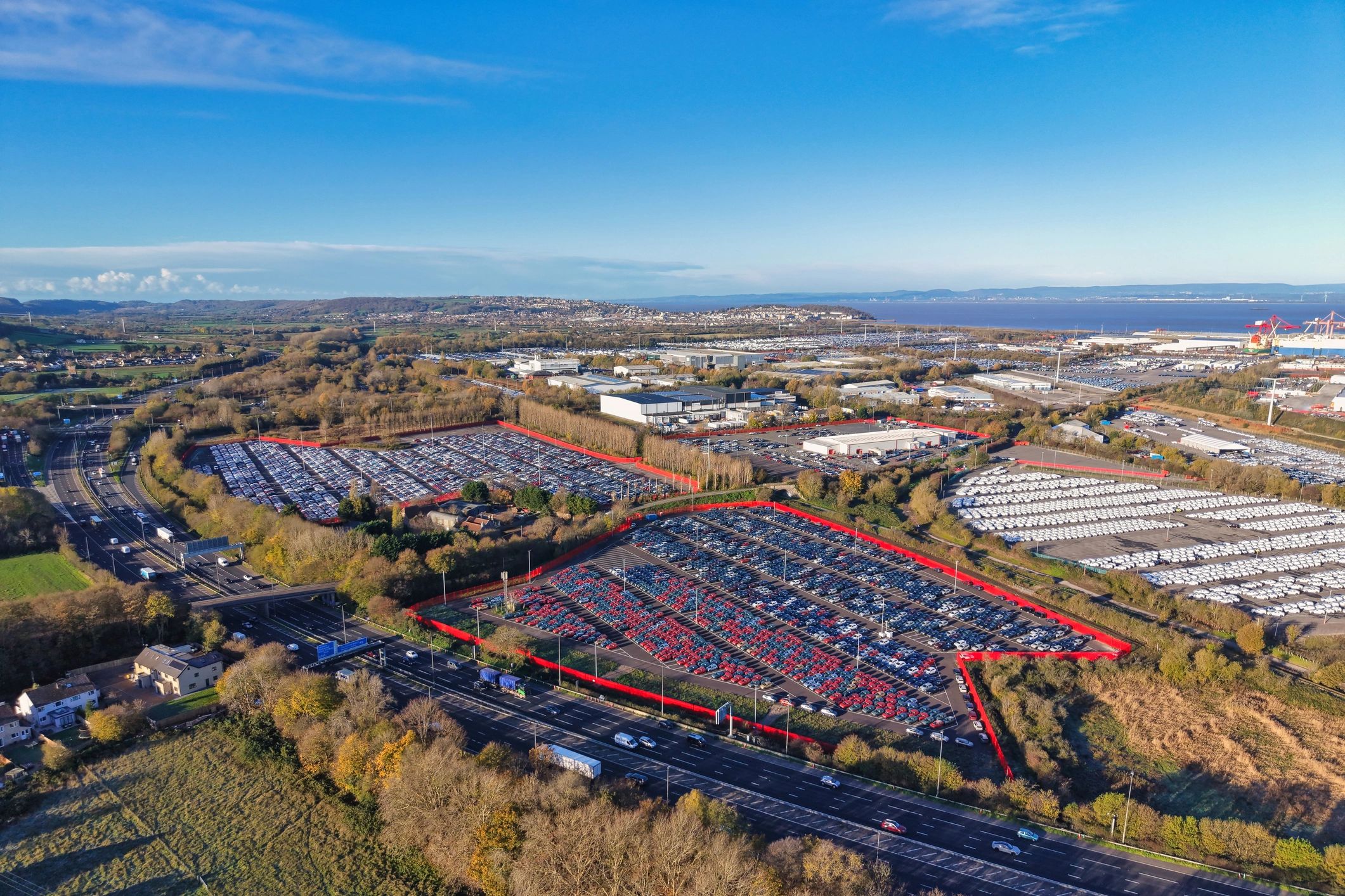 Aerial view of a large car distribution site near Bristol